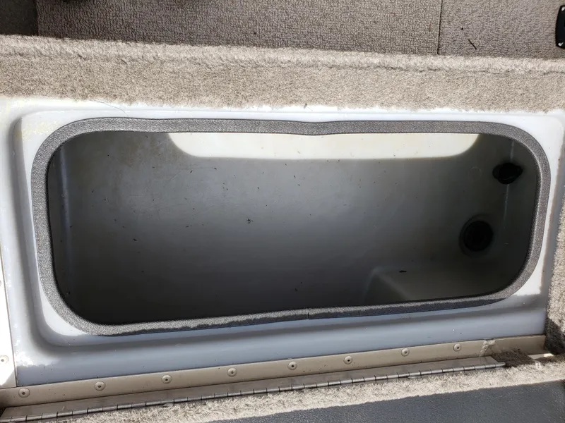 Slide: The Image of Storage compartment in a 2013 G3 V172C boat, featuring a spacious interior. - 7