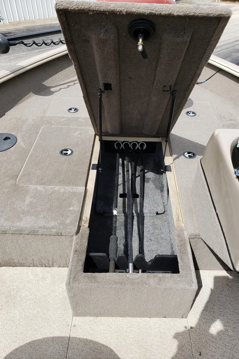 Slide: The Image of 2013 G3 V172C boat with open storage compartment for fishing rods. - 8