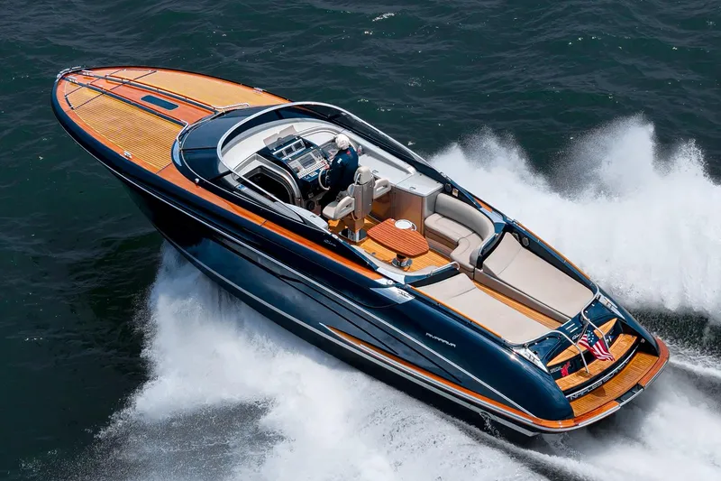 The Image of Luxury Riva 44 RivaRama yacht cruising on water, showcasing sleek design and elegance. - 0