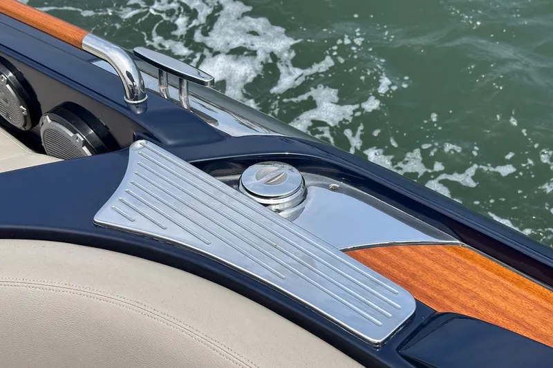 Slide: The Image of Luxury Riva 44 RivaRama yacht detail with sleek design and wood accents, 2006 model. - 20
