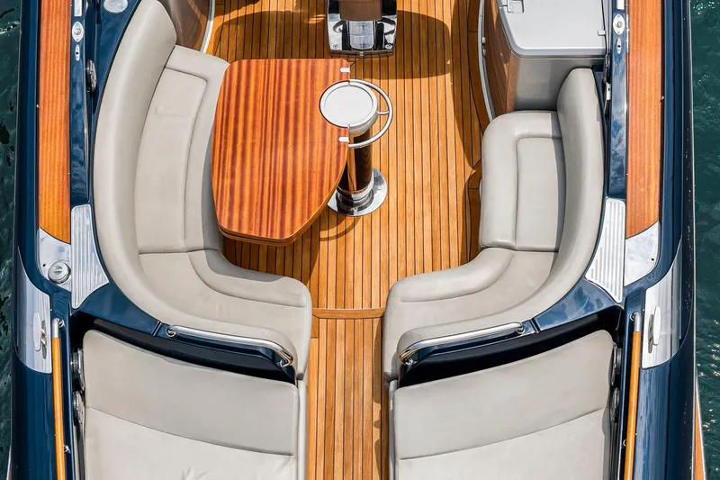 Slide: The Image of Luxurious Riva 44 RivaRama yacht interior with elegant seating and wooden deck, 2006 model. - 22