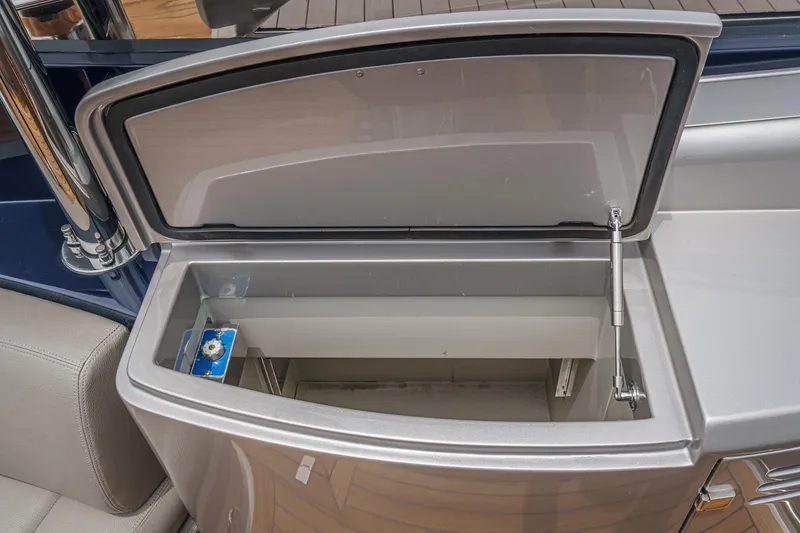 Slide: The Image of Open storage compartment on a 2006 Riva 44 RivaRama yacht, showcasing interior space. - 31