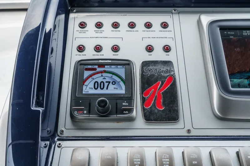 Slide: The Image of Control panel of a 2006 Riva 44 RivaRama yacht with navigation display. - 38