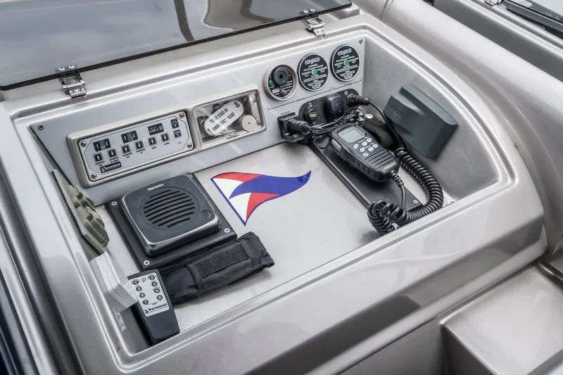 Slide: The Image of Control panel of 2006 Riva 44 RivaRama yacht with gauges and communication devices. - 42