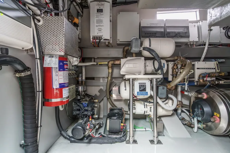 Slide: The Image of Engine room of 2006 Riva 44 RivaRama yacht, showcasing mechanical equipment and systems. - 46