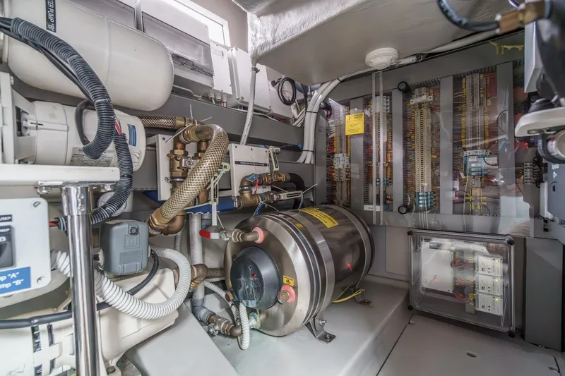 Slide: The Image of Engine room of 2006 Riva 44 RivaRama yacht, showcasing mechanical and electrical components. - 47