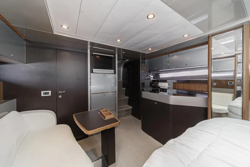 Slide: The Image of Luxurious interior of 2006 Riva 44 RivaRama yacht with modern furnishings and sleek design. - 49