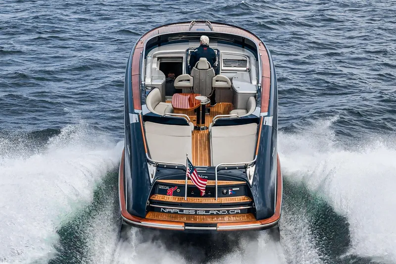 Slide: The Image of Luxury Riva 44 RivaRama yacht cruising on open water, rear view, 2006 model. - 5