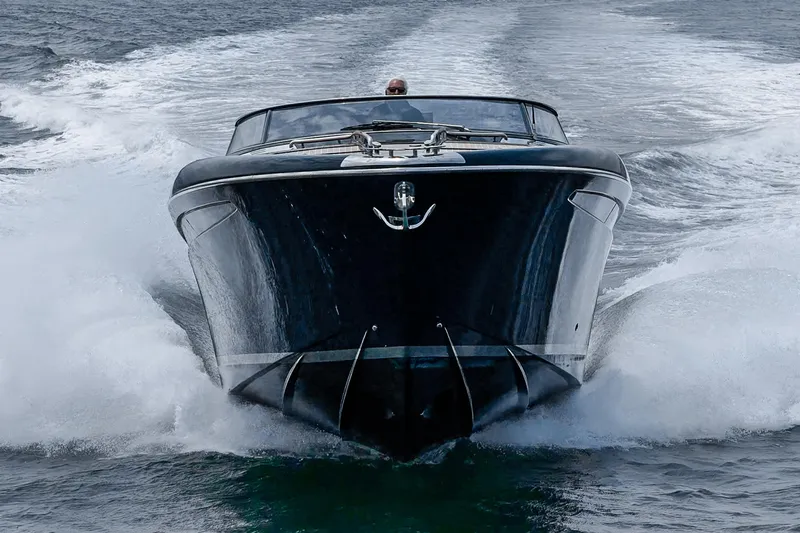 Slide: The Image of Luxury Riva 44 RivaRama yacht cruising on water, front view, 2006 model. - 8