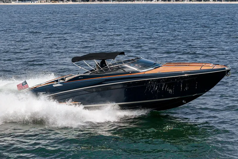 Slide: The Image of Luxury Riva 44 RivaRama yacht cruising on open water, 2006 model. - 9