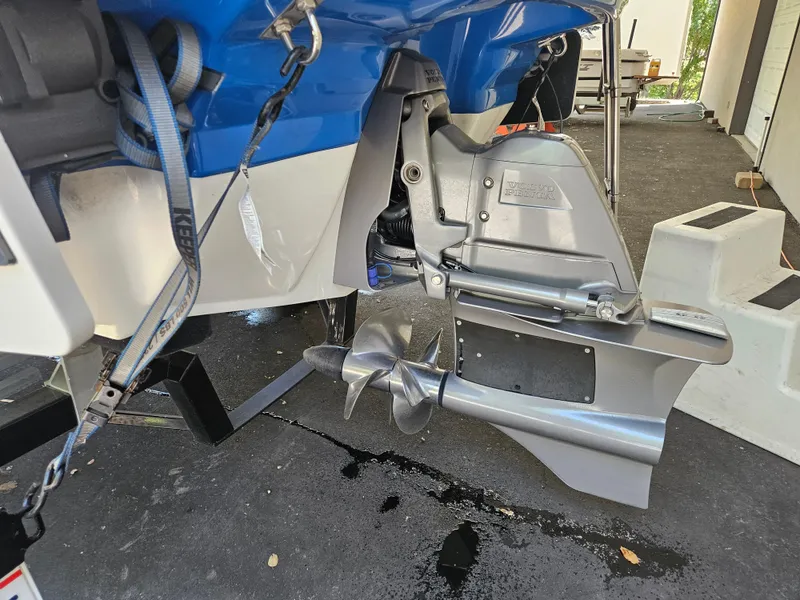 Slide: The Image of 2018 Chaparral 21 H2O Surf boat's outboard motor and propeller detail. - 4