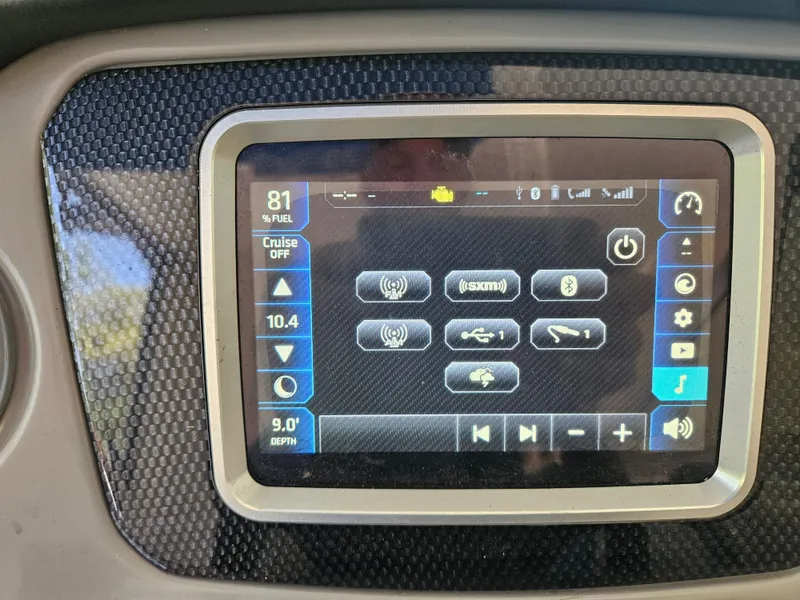 Slide: The Image of Touchscreen control panel of a 2018 Chaparral 21 H2O Surf boat displaying various settings. - 5