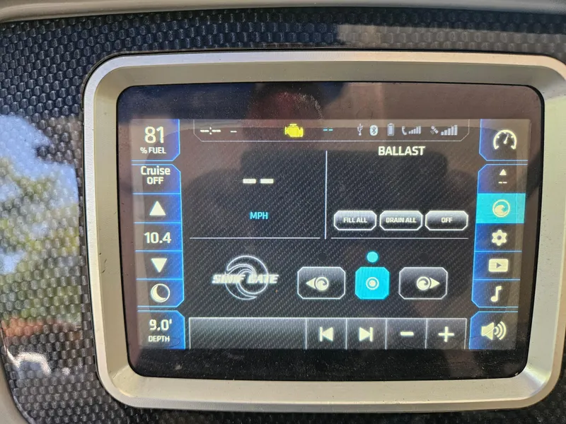 Slide: The Image of Touchscreen display of a 2018 Chaparral 21 H2O Surf boat showing fuel, speed, and ballast controls. - 9