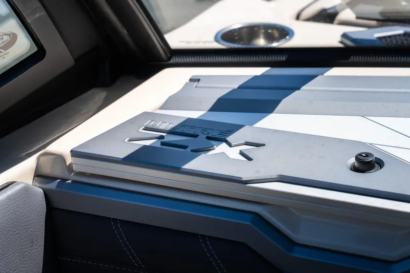 Slide: The Image of 2025 Tigé Ultré 23ZX boat interior detail with sleek design and modern features. - 20