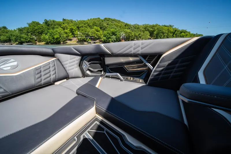 Slide: The Image of 2025 Tigé Ultré 23ZX boat interior with luxurious seating and modern design. - 23