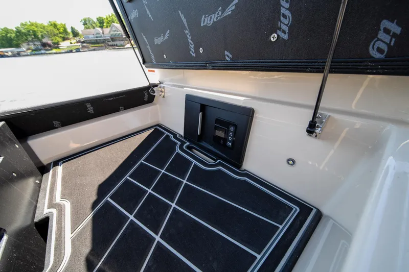 Slide: The Image of 2025 Tigé Ultré 23ZX boat interior with sleek design and modern control panel. - 42