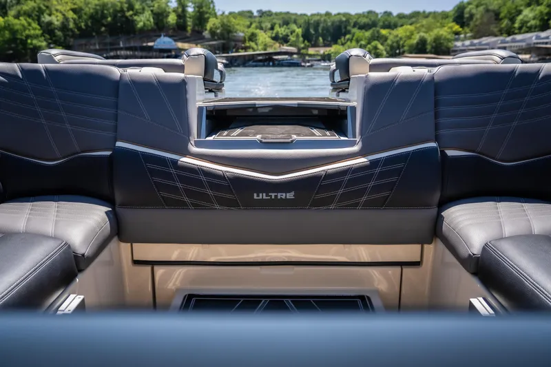 Slide: The Image of 2025 Tigé Ultré 23ZX boat interior with luxurious seating on a sunny day. - 48