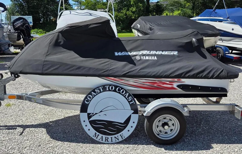 Slide: The Image of 2005 Yamaha WaveRunner FX Cruiser HO on trailer, covered, at Coast to Coast Marine. - 4