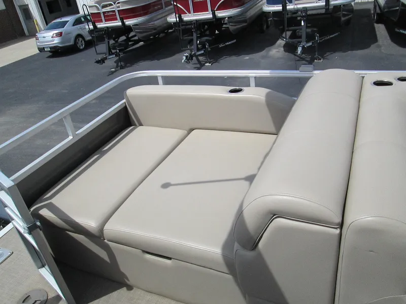 Slide: The Image of 2023 Sun Tracker PARTY BARGE 22RF XP3 pontoon boat seating area with beige upholstery. - 10