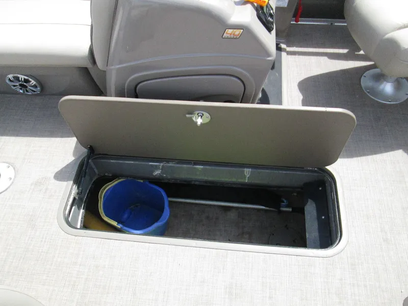 Slide: The Image of Storage compartment on 2023 Sun Tracker PARTY BARGE 22RF XP3 with bucket inside. - 16