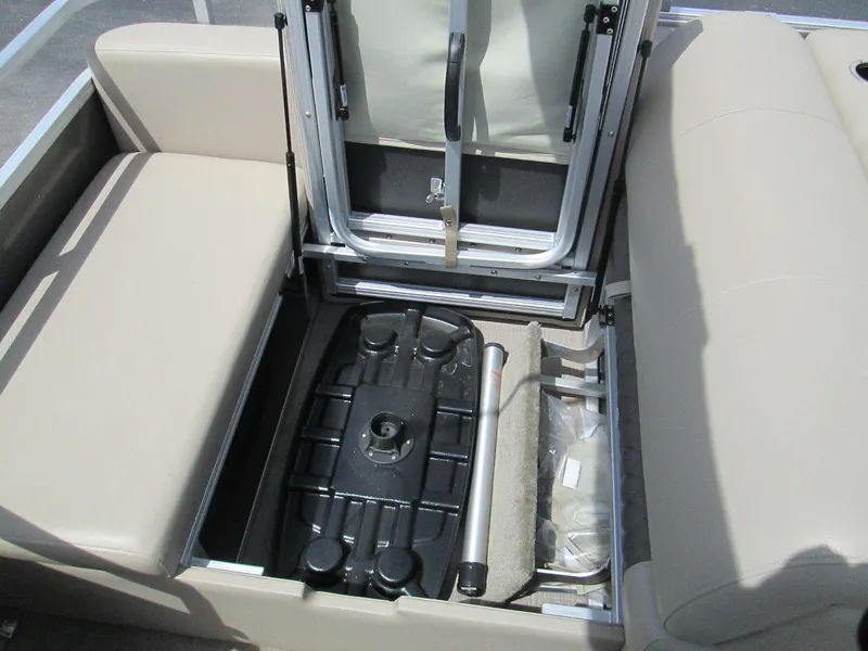 Slide: The Image of 2023 Sun Tracker PARTY BARGE 22RF XP3 storage compartment with seating and equipment. - 19
