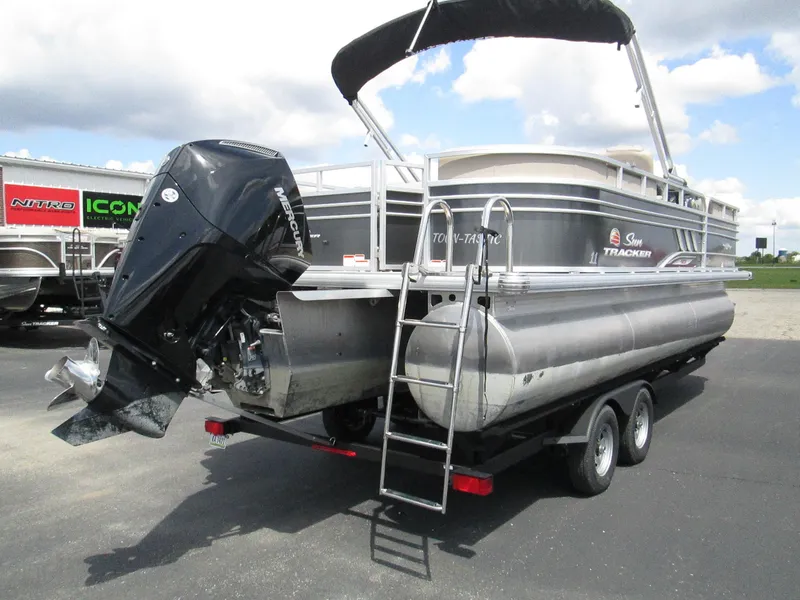Slide: The Image of 2023 Sun Tracker PARTY BARGE 22RF XP3 pontoon boat with outboard motor and trailer. - 6