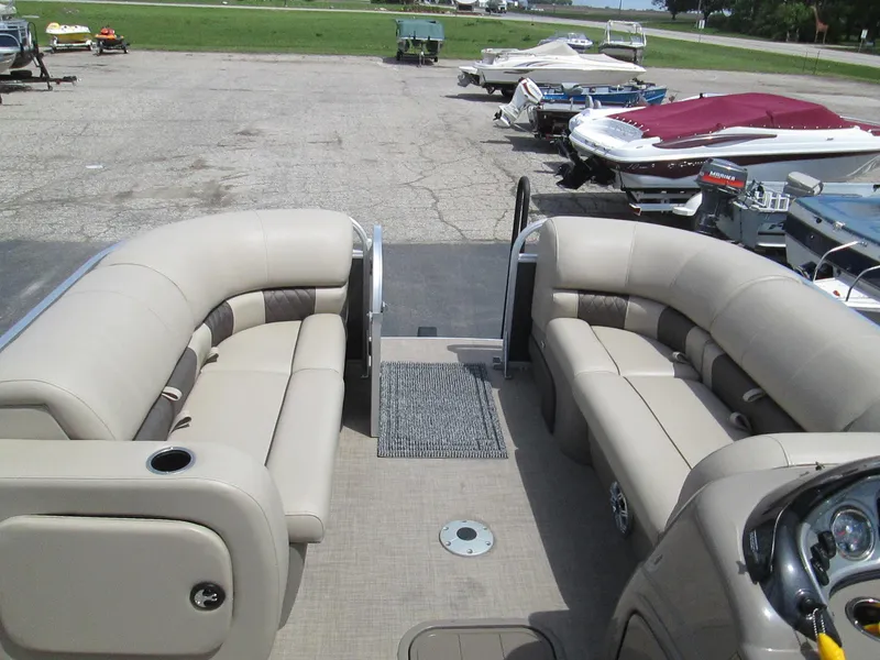 Slide: The Image of 2023 Sun Tracker PARTY BARGE 22RF XP3 pontoon boat with spacious seating and modern design. - 8