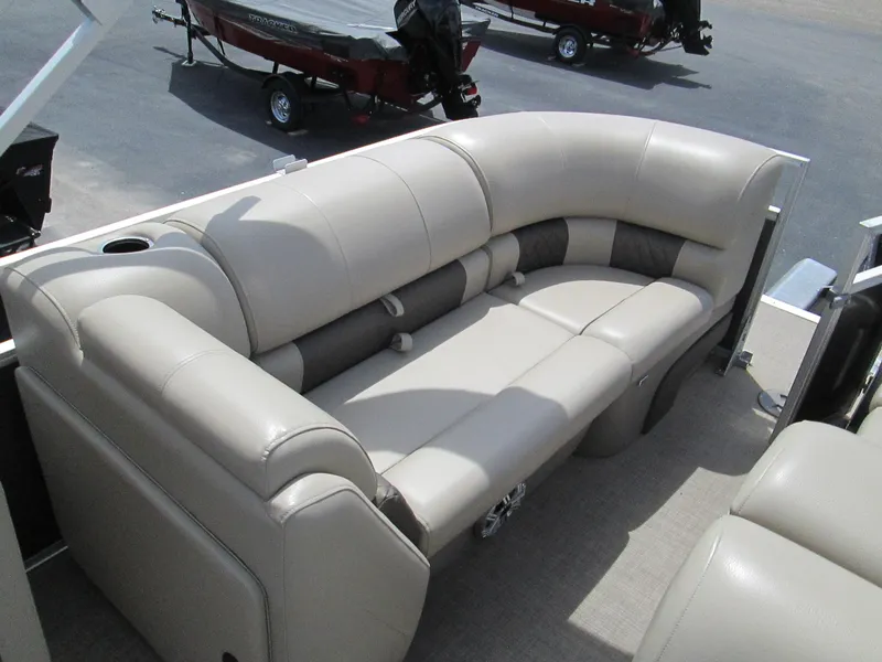 Slide: The Image of 2023 Sun Tracker PARTY BARGE 22RF XP3 pontoon boat seating, beige upholstery, spacious and comfortable design. - 9
