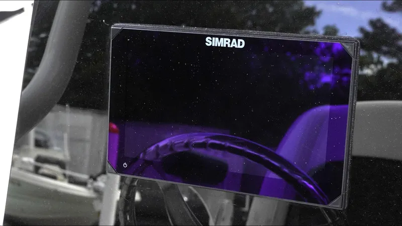Slide: The Image of Simrad display on 2025 Tidewater 198 CC Adventure boat dashboard. - 11