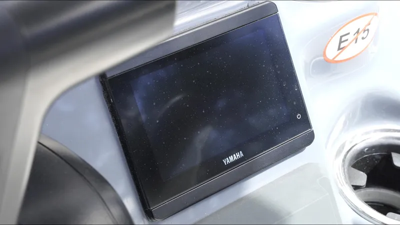 Slide: The Image of 2025 Tidewater 198 CC Adventure dashboard with Yamaha display screen. - 13