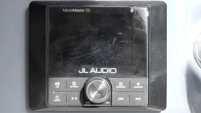 Slide: The Image of JL Audio MediaMaster 55 control panel on 2025 Tidewater 198 CC Adventure boat. - 15