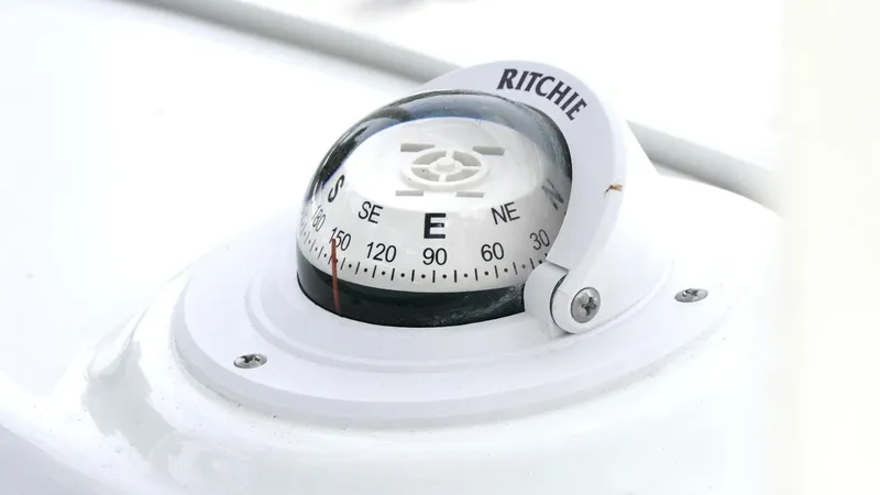 Slide: The Image of Compass on 2025 Tidewater 198 CC Adventure boat dashboard. - 18