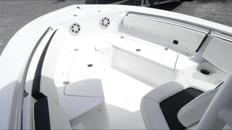 Slide: The Image of 2025 Tidewater 198 CC Adventure boat interior with seating and speakers. - 19