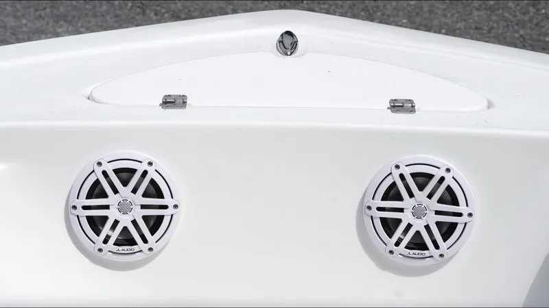 Slide: The Image of 2025 Tidewater 198 CC Adventure boat speakers and storage compartment. - 20