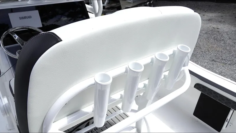 Slide: The Image of 2025 Tidewater 198 CC Adventure boat seat with integrated rod holders. - 23