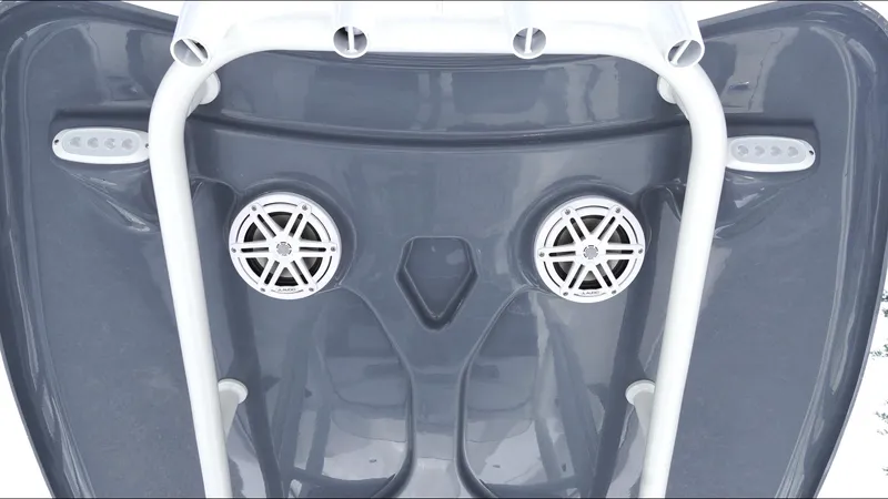 Slide: The Image of 2025 Tidewater 198 CC Adventure boat interior with speakers and sleek design. - 24