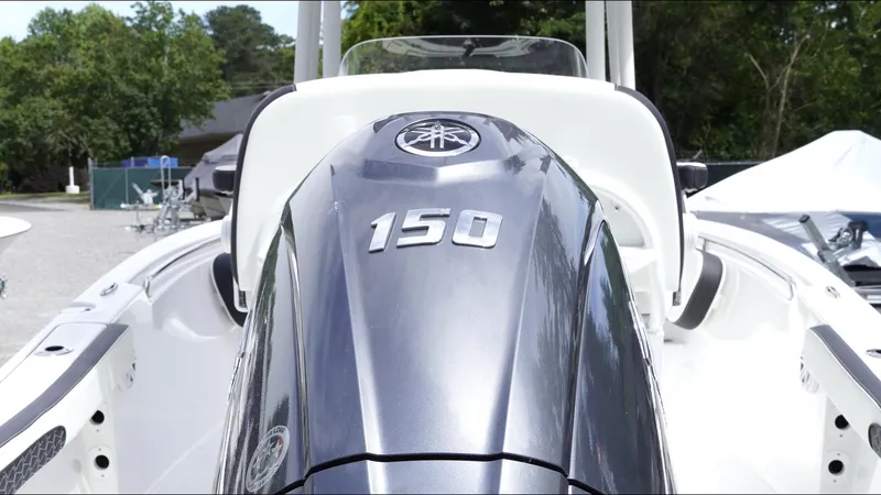 Slide: The Image of 2025 Tidewater 198 CC Adventure boat with Yamaha 150 engine, outdoor setting. - 31