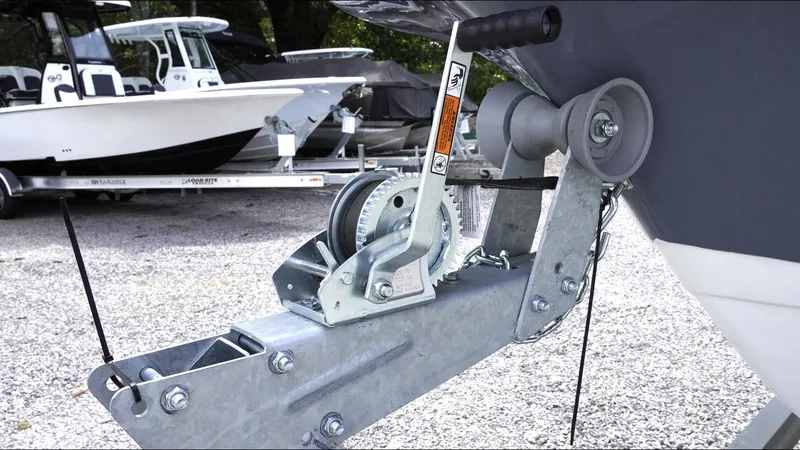 Slide: The Image of Trailer hitch of 2025 Tidewater 198 CC Adventure boat, parked on gravel. - 35