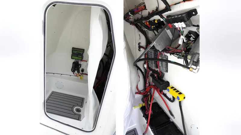 Slide: The Image of 2025 Tidewater 198 CC Adventure boat interior wiring and storage compartment. - 36