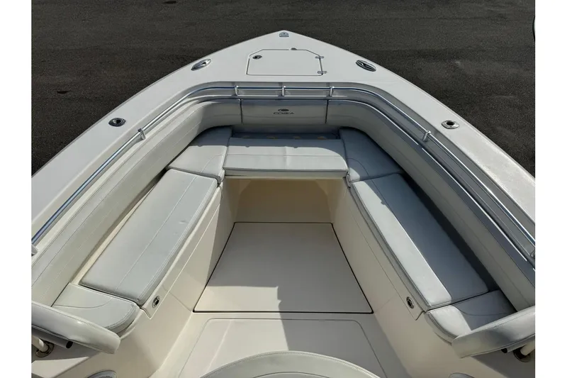 Slide: The Image of 2017 Cobia 344 Center Console boat with spacious seating area. - 4