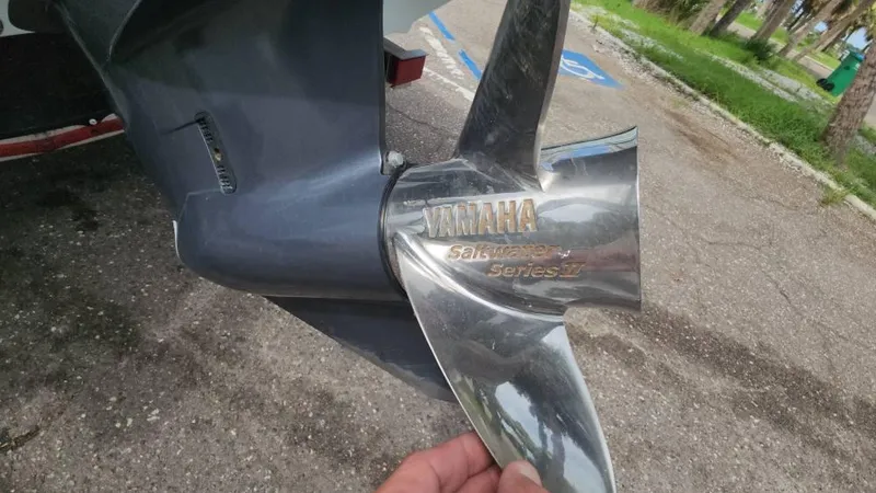 Slide: The Image of Yamaha Saltwater Series II propeller on 2020 Robalo 246 Cayman boat. - 11