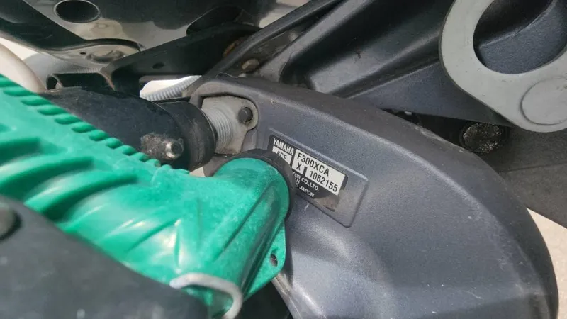 Slide: The Image of Close-up of Yamaha F300XCA engine on 2020 Robalo 246 Cayman boat. - 12