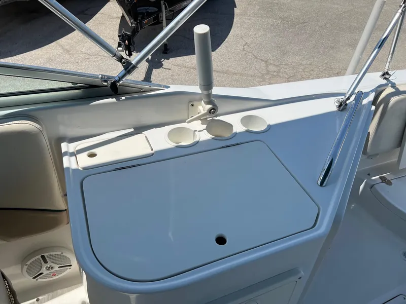 Slide: The Image of Chris-Craft 260DB boat deck with cup holders and storage, 2000 model. - 16