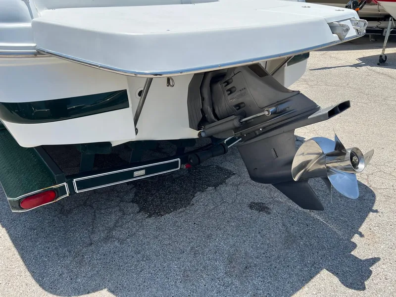 Slide: The Image of Rear view of a 2000 Chris-Craft 260DB boat with visible propeller and trailer. - 7