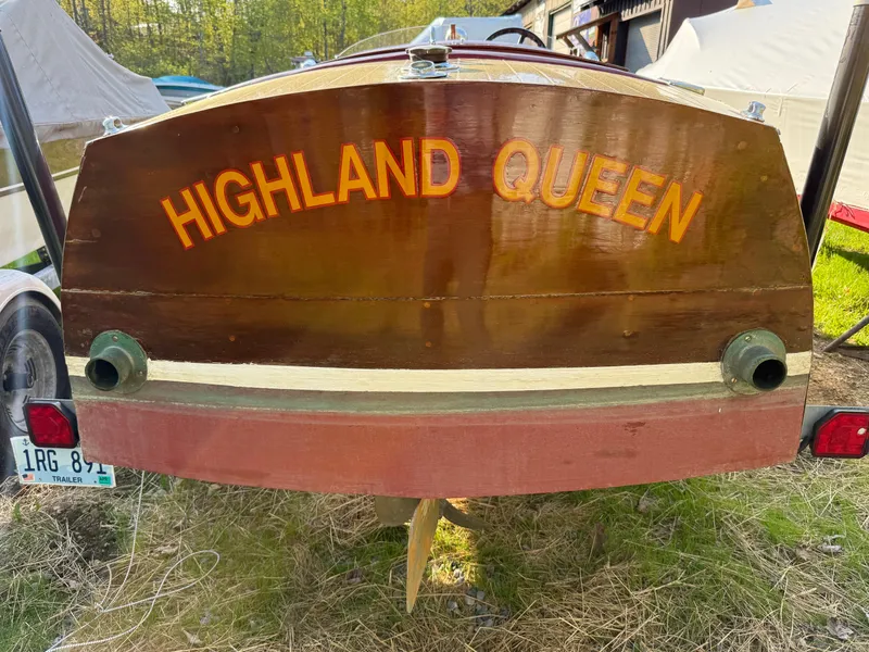 Slide: The Image of 1932 Chris-Craft 301 boat named "Highland Queen" with wooden finish, displayed outdoors. - 16