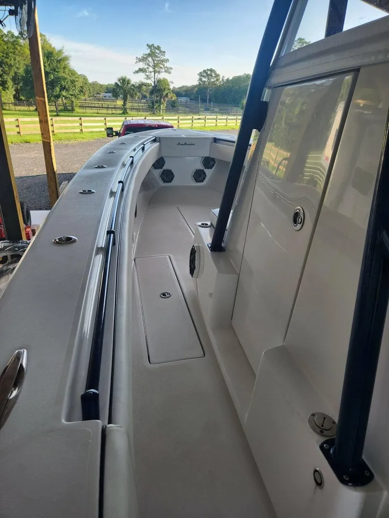 Slide: The Image of 2013 SeaHunter 35 Tournament boat interior with sleek design and spacious deck. - 22