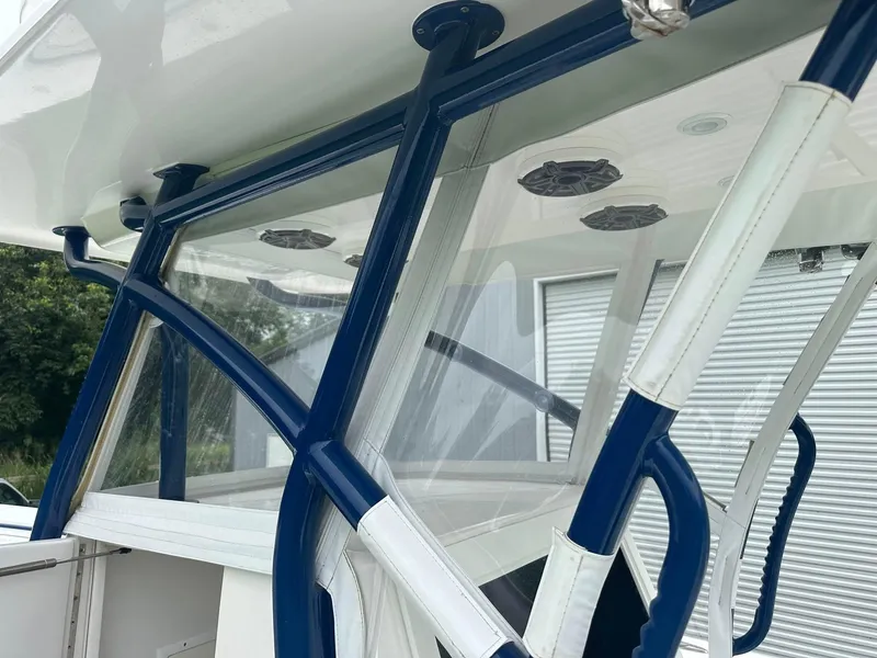 Slide: The Image of 2013 SeaHunter 35 Tournament boat with blue and white frame detailing. - 6