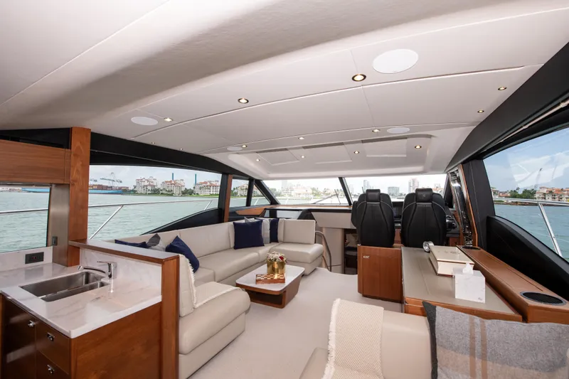 Slide: The Image of Luxurious interior of 2021 Princess S66 yacht with modern seating and panoramic windows. - 10