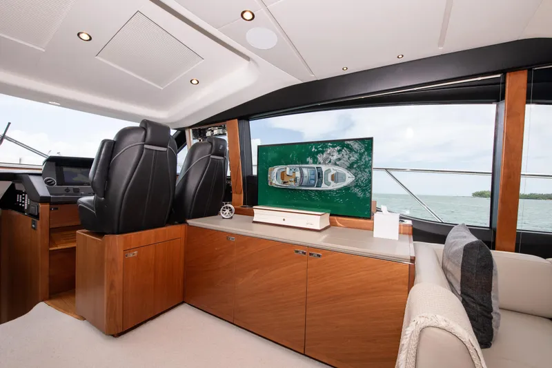 Slide: The Image of Luxurious interior of 2021 Princess S66 yacht with modern seating and ocean view. - 11