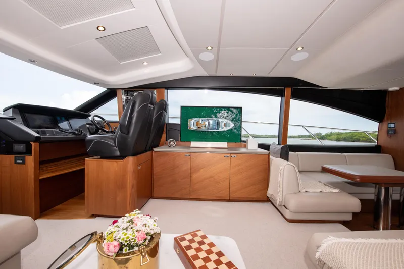 Slide: The Image of Luxurious interior of 2021 Princess S66 yacht with elegant seating and helm station. - 12